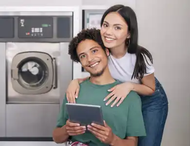 Happy Laundromat Couple Shutterstock 2313678297 Resized